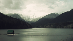 Mountains clouds cabin