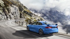 Mountains clouds cars jaguar roads vehicles rear angle view 