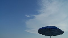 Mountains clouds Italy skies skyscapes beach umbrella calabria