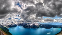 Mountains clouds lakes