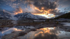 Mountains clouds lakes reflections sunlight