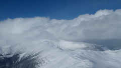 Mountains clouds snow