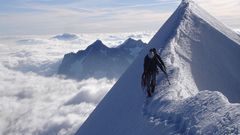 Mountains clouds snow mountaineers