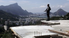 Mountains hills War weapons Guns police slum Rio de Janeiro 