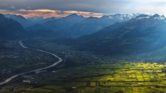 Mountains landscape field clouds