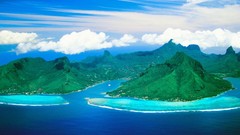 Mountains ocean clouds