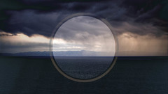 Mountains ocean clouds horizon