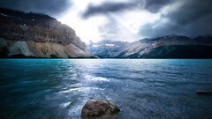 Mountains Sea rock blue sunlight water stones clouds landscape