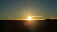 Mountains silhouettes sunlight skies blue skies