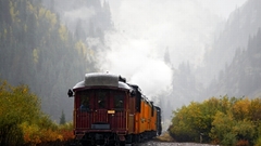 Mountains trains mist vehicles