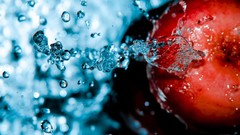 Movement water drops red apple food fruits
