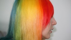 Multicolor rainbows hair in face