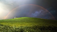 Nature clouds rain hills Green houses rainbows