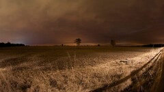 nature field landscape storm clouds