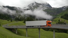 Nature grass Mountains clouds orange trailer Scania