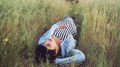 Nature grass woman closed eyes lying down
