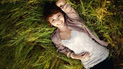 Nature grass woman smiling brunettes lying down white shirt