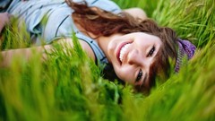 Nature grass woman smiling depth of field