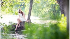 Nature Trees dress hats sitting outdoors asians smiling 