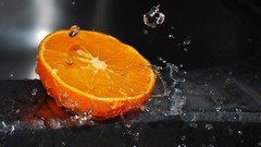 Nature water oranges wet fruits selective coloring
