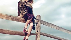 Nature woman dress sitting fences high heels