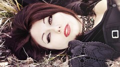 Nature woman faces brown eyes red lipstick boobs