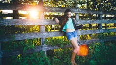 Nature woman Shorts fences sunlight boots brunettes
