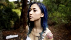 Nature woman tattoos blue hair piercings