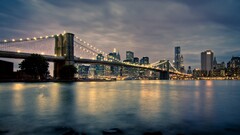 new york city brooklyn bridge cityscape lights water sky USA