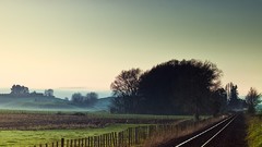 New Zealand Wooden fence railroad tracks farmland