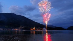 Night Austria fireworks lakes reflections cityscapes