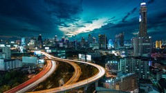 Night clouds light lights traffic buildings skies cityscapes