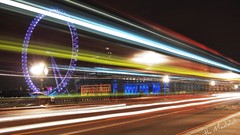 Night lights streets ferris wheels citylife