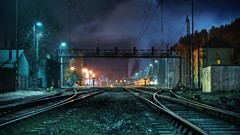 Night lights vehicles railroad tracks trains railroads