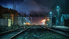 Night vehicles railroad tracks trains