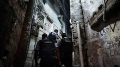 Night War weapons Guns police alley slum Rio de Janeiro Brazil 