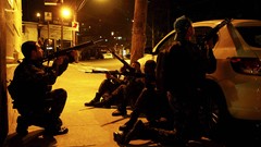 Night War weapons Guns police sepia slum Cover Rio de Janeiro 