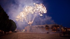 Night white lights smoke explosions fireworks TV shows 