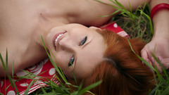 Nude woman grass smiling
