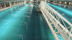 Ocean basin rotating arm