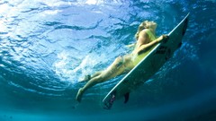 Ocean woman surfing blondes