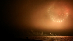 Orange fireworks at Sea
