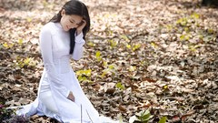 Outdoors asians long hair brunettes white dress teen kneeling 
