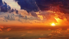 Over clouds orange sky