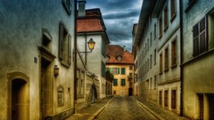 Past houses shadows streets street lights streetscape