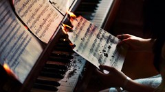 Piano burning music notes