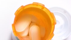 pills orange white macro