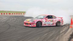 Pink cars drifting cars