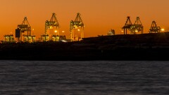 ports cranes (machine) dock night Sea Containers water lights