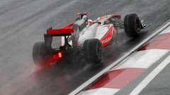 race cars racing Sports Sport McLaren wet asphalt